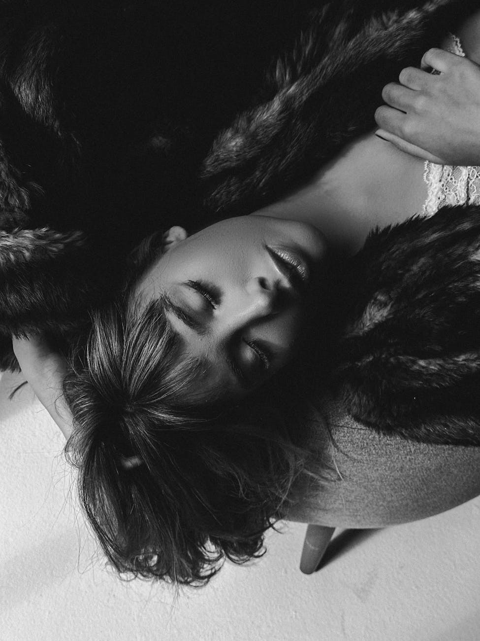 elegant black and white portrait of resting woman