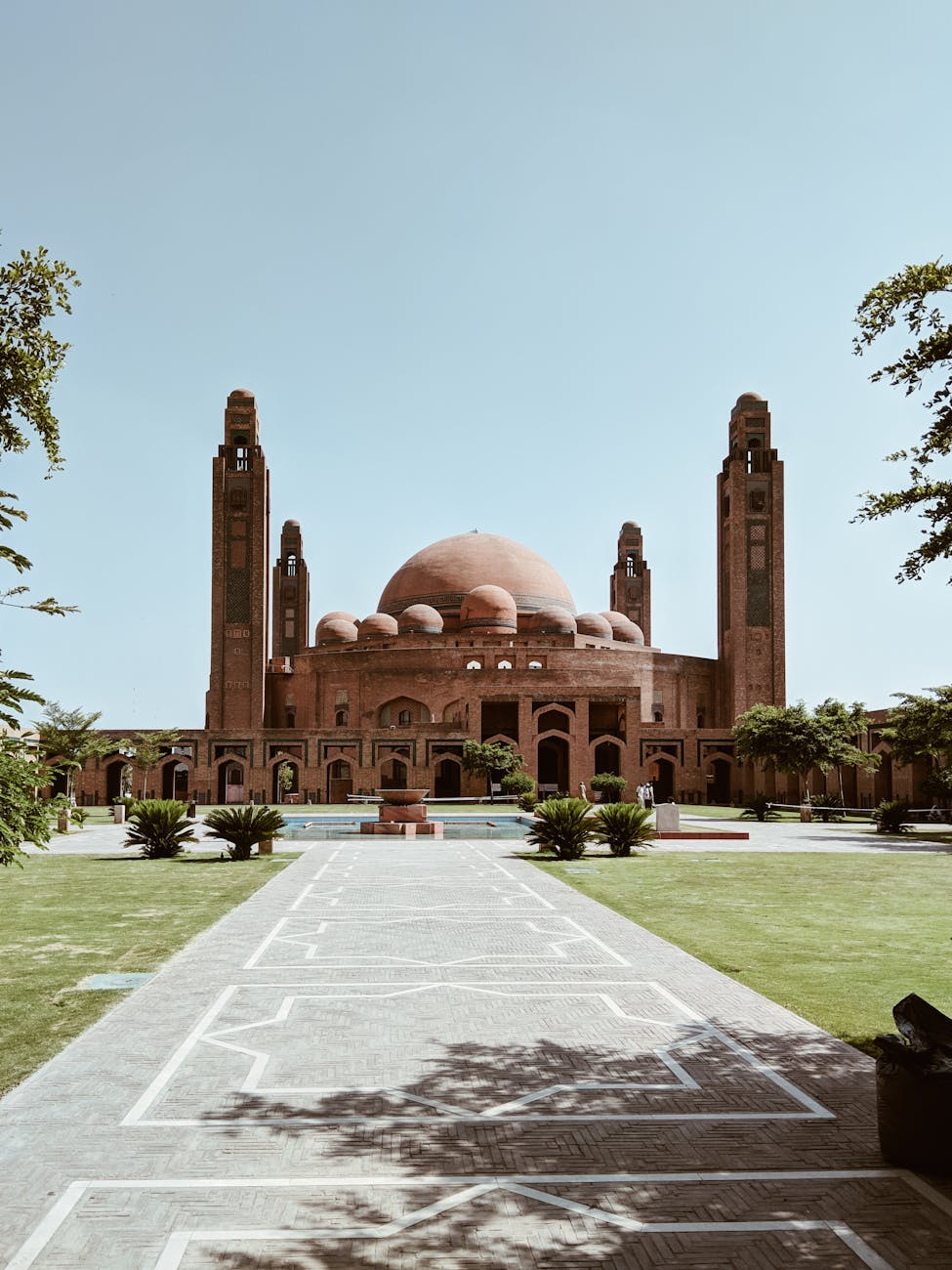 brown concrete domed building surrounded with trees